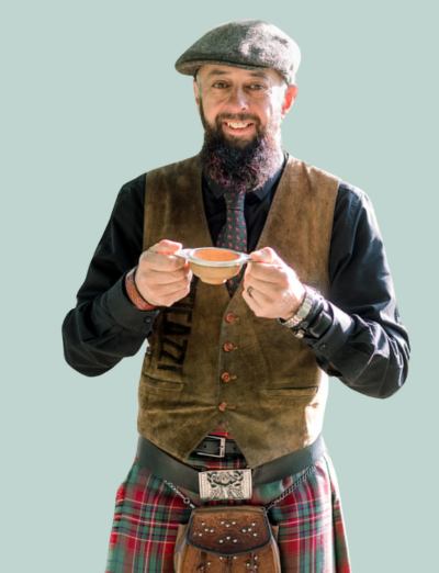 Schuggie from Schuggies-Ceilidhs with a traditional friendship cup, a Quaich Schuggie from Schuggies-Ceilidhs with a traditional friendship cup, a Quaich